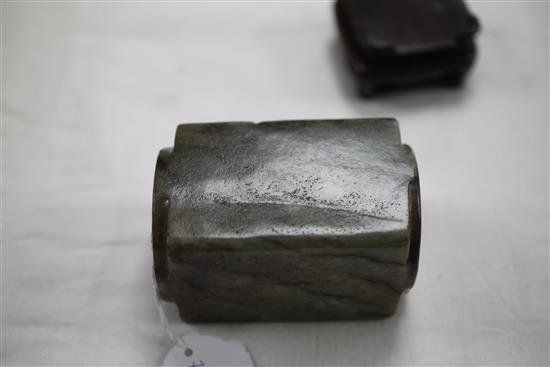 A Chinese grey and black veined jade cong, Ming dynasty, 9.7cm, fitted wood stand